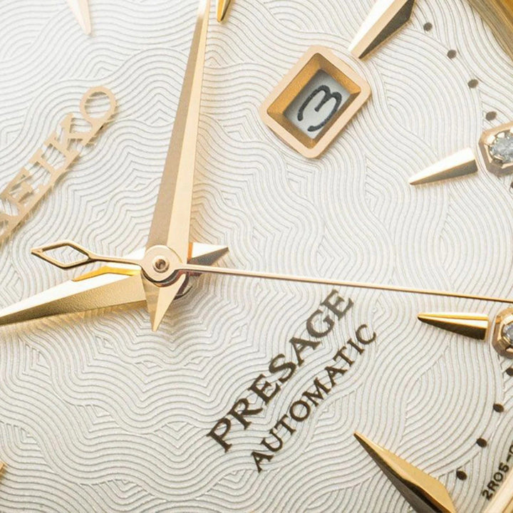 SEIKO PRESAGE COCKTAIL TIME WHITE LADY DIAMOND TWIST AUTOMATIC LADIES WATCH – 30.3MM CHAMPAGNE DIAL GOLD-TONE BRACELET