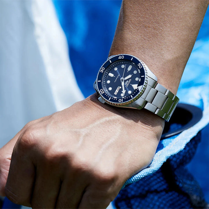 SEIKO 5 SPORTS AUTOMATIC WATCH – 42.5MM ORANGE DIAL STEEL BRACELET