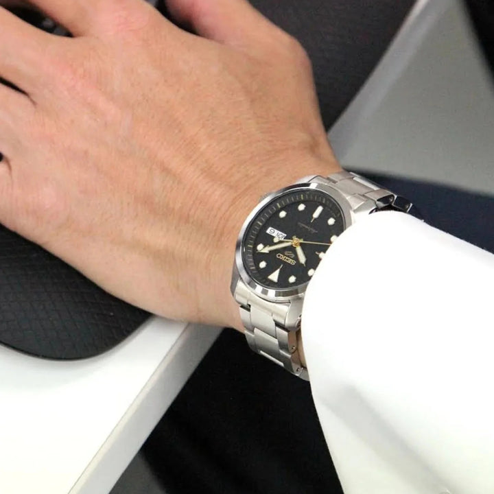 SEIKO 5 SPORTS AUTOMATIC WATCH – 40MM BLACK DIAL GOLD-TONE INDICES STEEL BRACELET