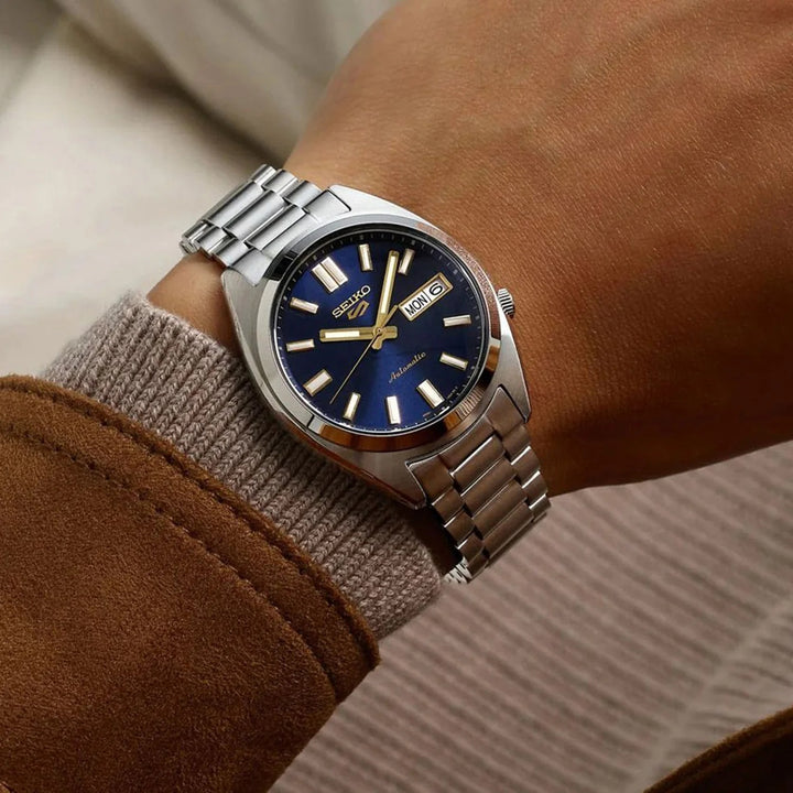 SEIKO 5 SPORTS SNXS AUTOMATIC WATCH – 37.4MM BLUE SUNRAY DIAL GOLD-TONE HANDS STEEL BRACELET