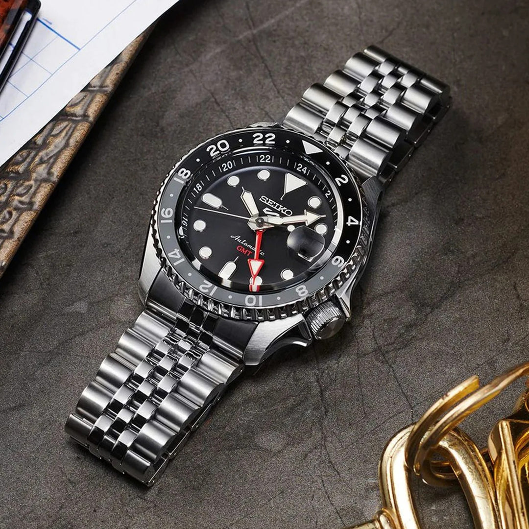 SEIKO 5 SPORTS SKX SPORTS STYLE GMT AUTOMATIC WATCH – 42.5MM BLACK DIAL ROTATING BEZEL JUBILEE BRACELET