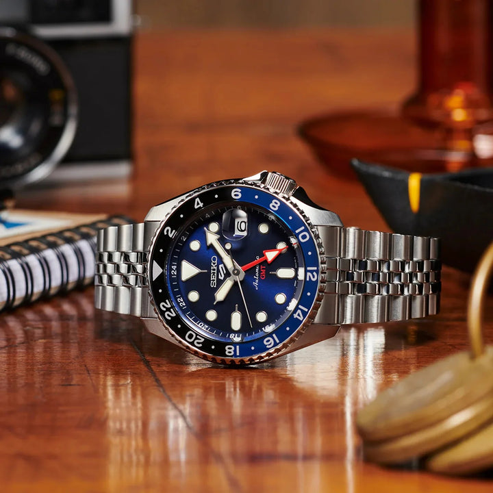 SEIKO 5 SPORTS SKX SPORTS STYLE GMT AUTOMATIC WATCH – 42.5MM BLUE SUNRAY DIAL ROTATING BEZEL JUBILEE BRACELET
