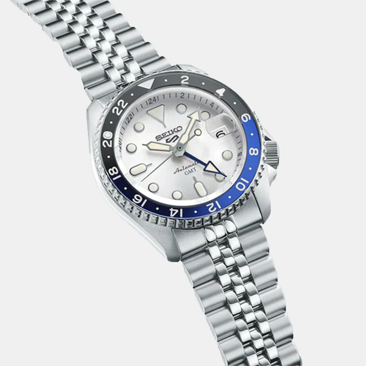 SEIKO 5 SPORTS SKX SPORTS STYLE GMT AUTOMATIC WATCH – 42.5MM SILVER WHITE DIAL BLUE GMT HAND JUBILEE BRACELET
